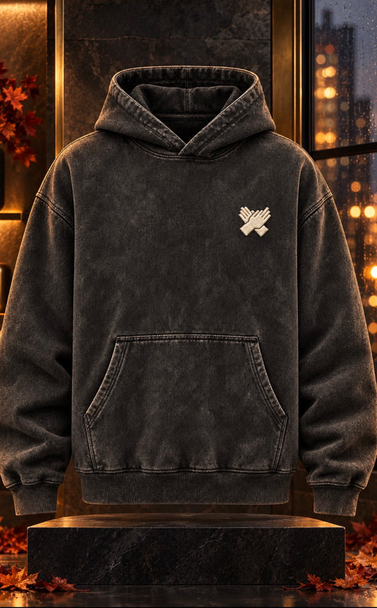     Vintage black oversized hoodie with cream embroidered hand logo, front view