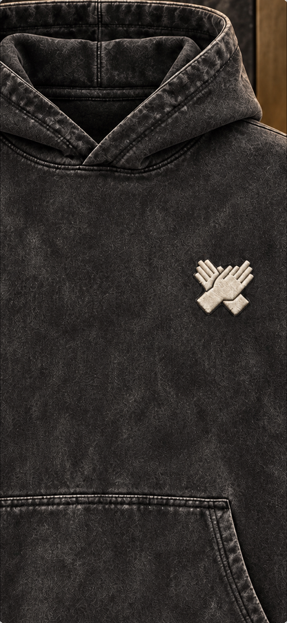 Cream puff-embroidered crossed-hands logo on vintage black hoodie