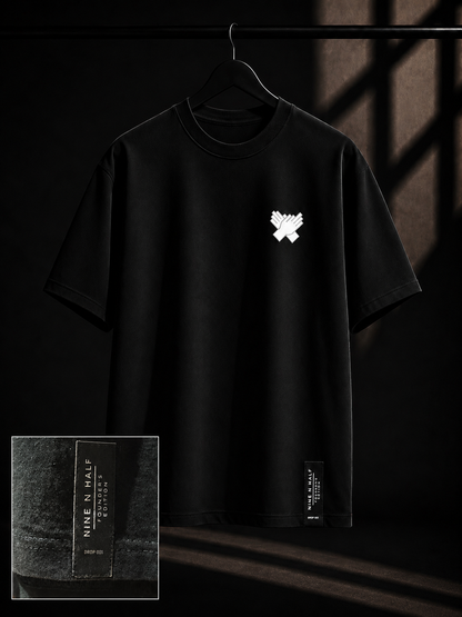     Close-up of black Nine N Half Founders Collection tee patch 