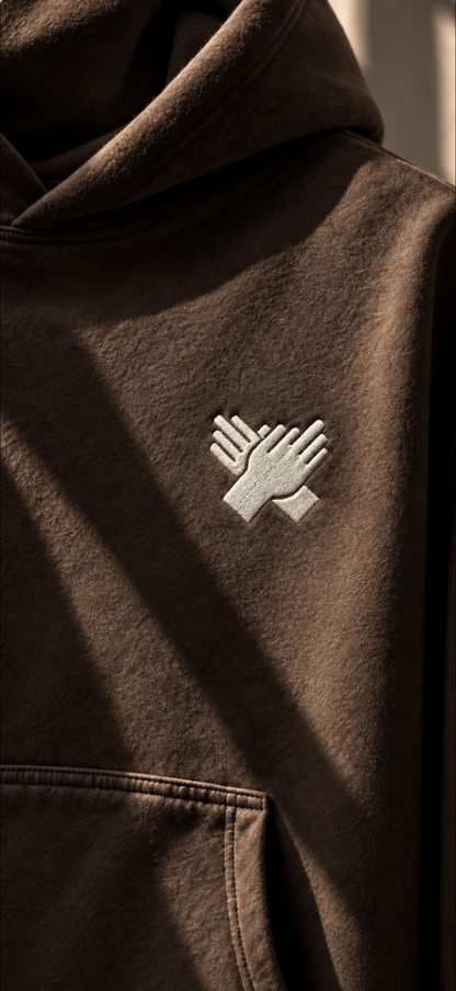     NINE N HALF embroidered hand logo on brown heavyweight hoodie – close-up