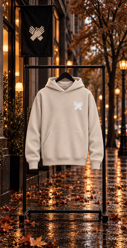     Bone cream oversized heavyweight hoodie with white silicone hand logo, front view